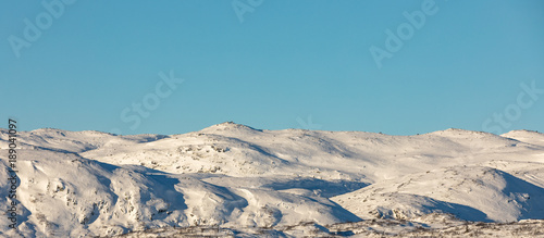 Norwegian winter, mountain landscape with snow. Panorama. © Lillian