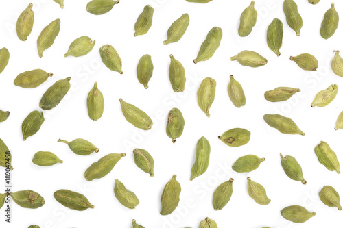 Green cardamom seeds isolated on white background. Top view. lay flat