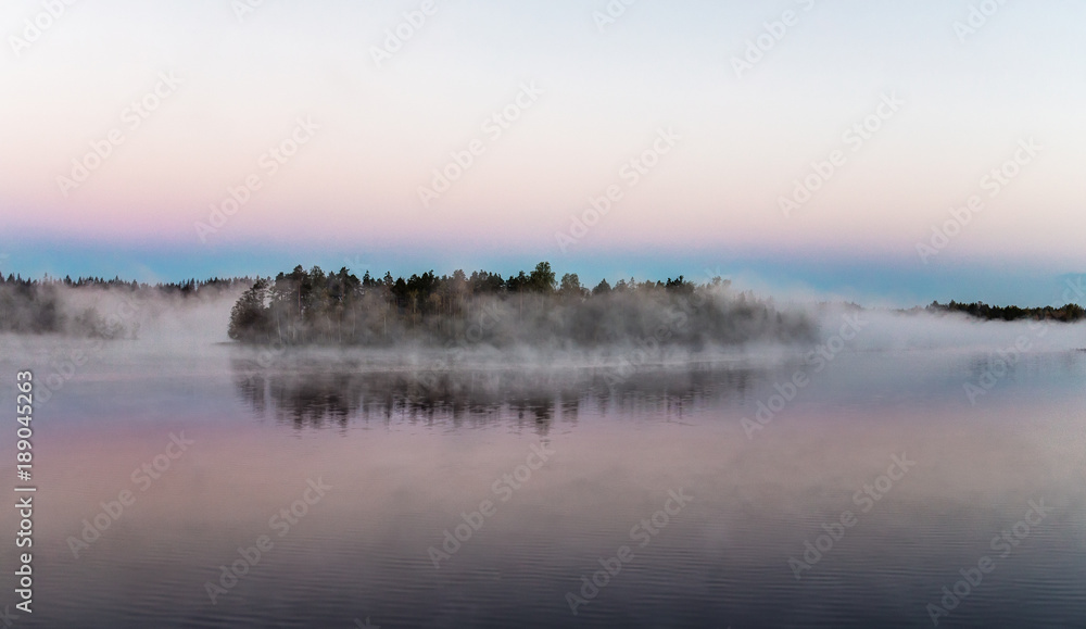 island on a forest lake island on a forest lake