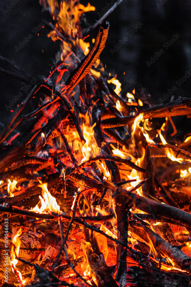 Blazing branches and firewood at night Blazing branches and firewood at night