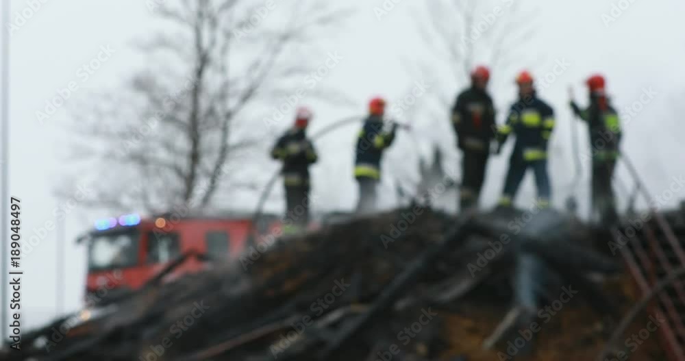 Firefighter or fireman fiting with fire on home. Firefighter or fireman fiting with fire on home.