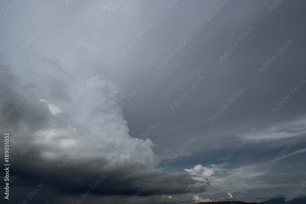 dark storm clouds with background,Dark clouds before a thunder-storm. dark storm clouds with background,Dark clouds before a thunder-storm.