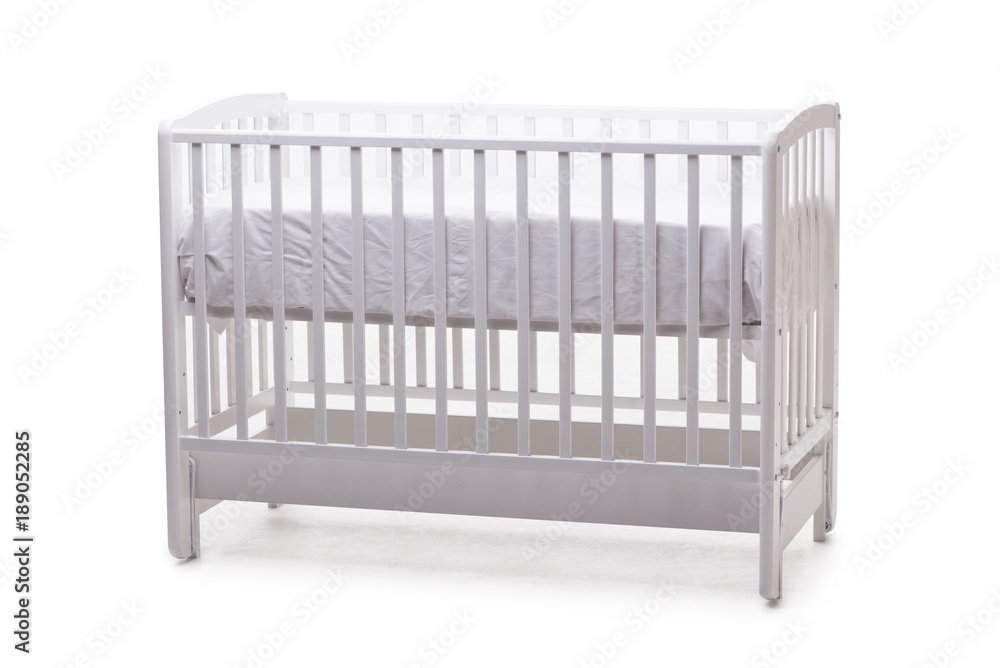 Baby bed cot isolated on the white background Baby bed cot isolated on the white background