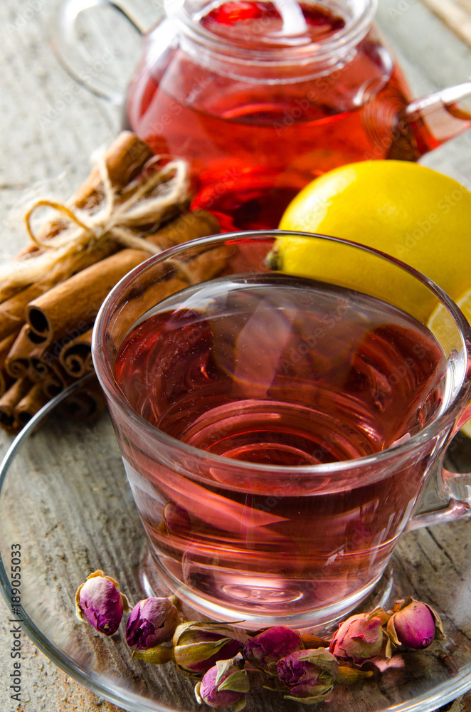 Fruit berry tea in the cup served on table Fruit berry tea in the cup served on table