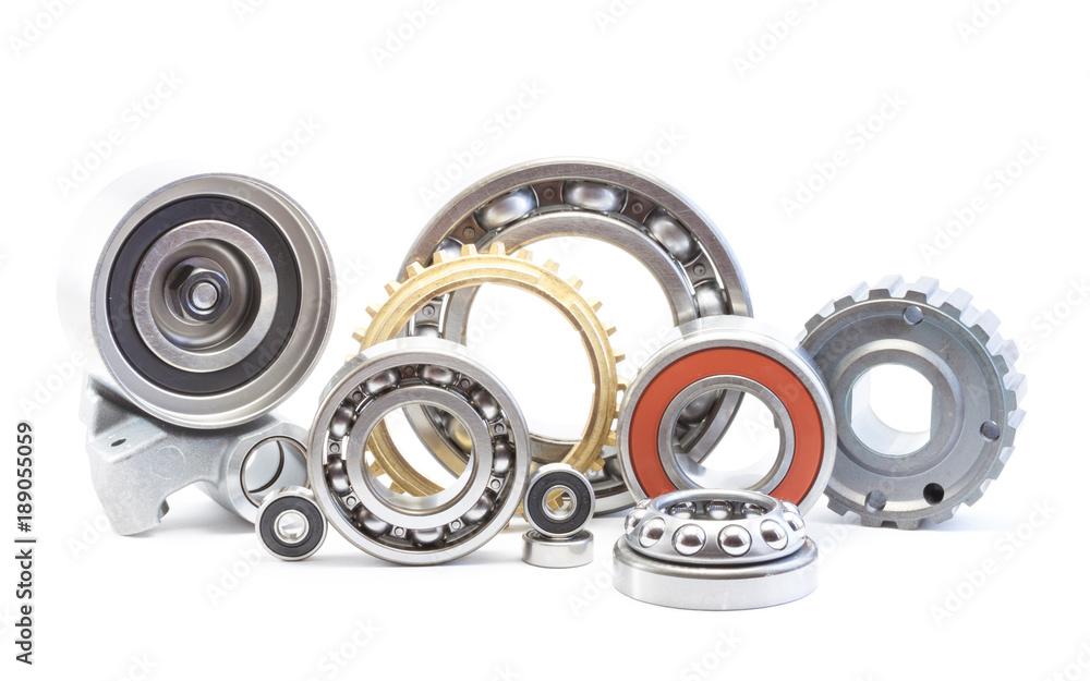 Bearing, rollers and gear parts isolated on white, automotive industry Bearing, rollers and gear parts isolated on white, automotive industry