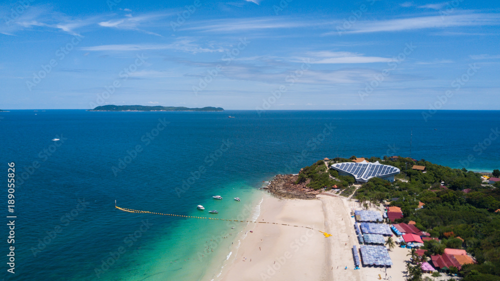 Aerial view of beautiful beach at Koh Larn in Pattaya, Thailand, huge infrastructure of solar cell plant