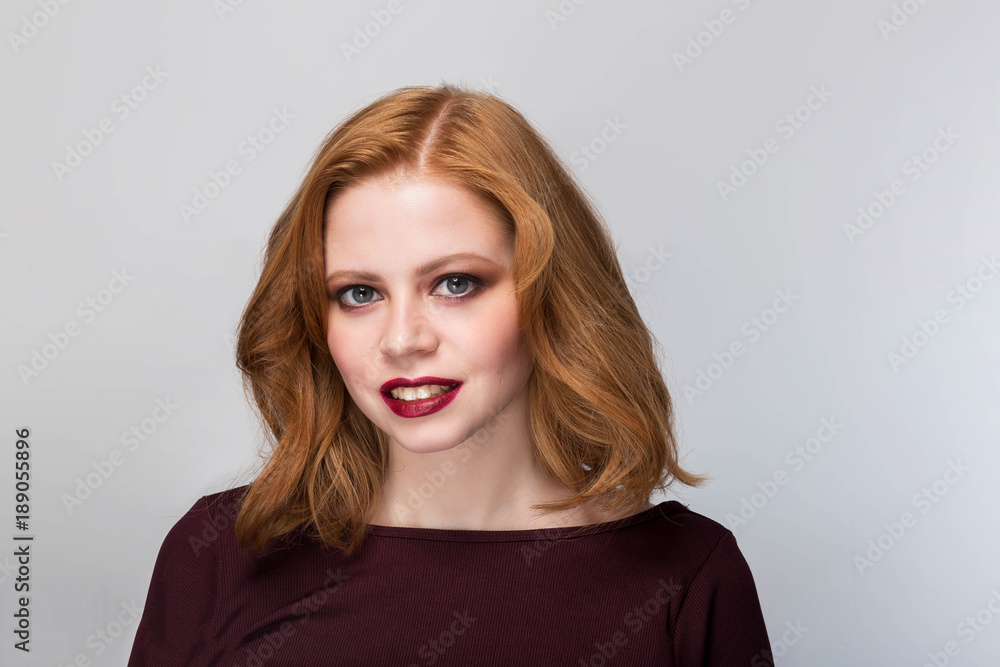 Portrait of beautiful redhead woman. Positive emotions, smile, sincerity, happiness, expressive face. Portrait of beautiful redhead woman. Positive emotions, smile, sincerity, happiness, expressive face.