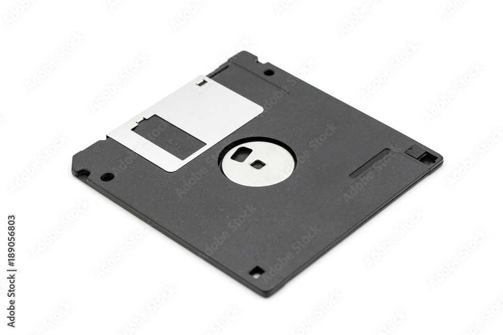 A black floppy disk isolated on white background, old technology for memory card A black floppy disk isolated on white background, old technology for memory card
