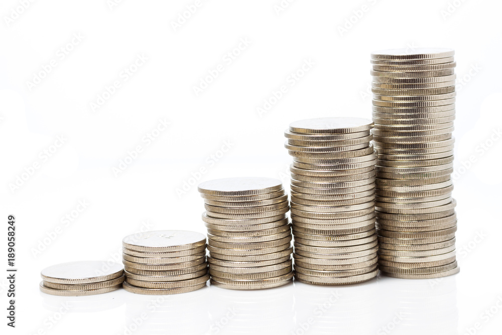 Close up Stacks of Thai coins, rising trend isolated on white Close up Stacks of Thai coins, rising trend isolated on white