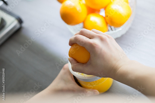 Squeezing Orange Juice by Hand