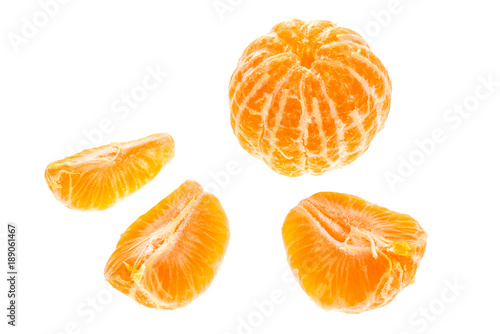Orange tangerines mandarin pieces isolated on white background.