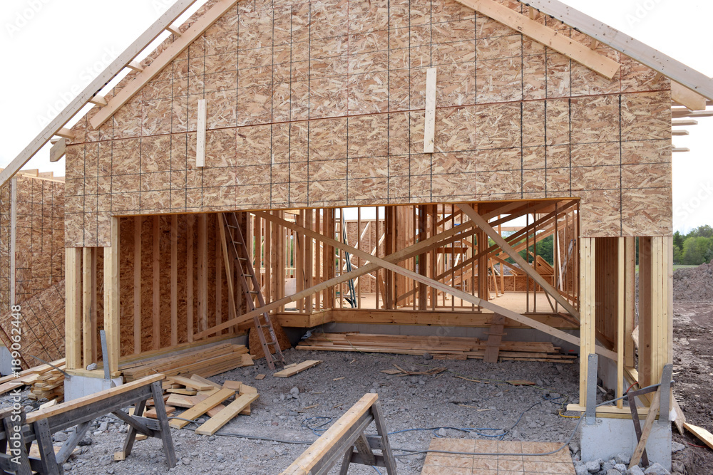 Fototapeta premium Nowy dom Budowa szkieletu Lumber Builders Stolarz Craftsman