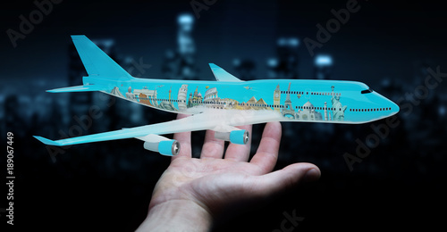 Fototapeta Naklejka Na Ścianę i Meble -  Businessman with plane and famous landmarks of the world 3D rendering