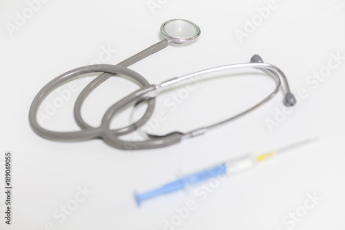 Medical essential - syringe and stethoscope