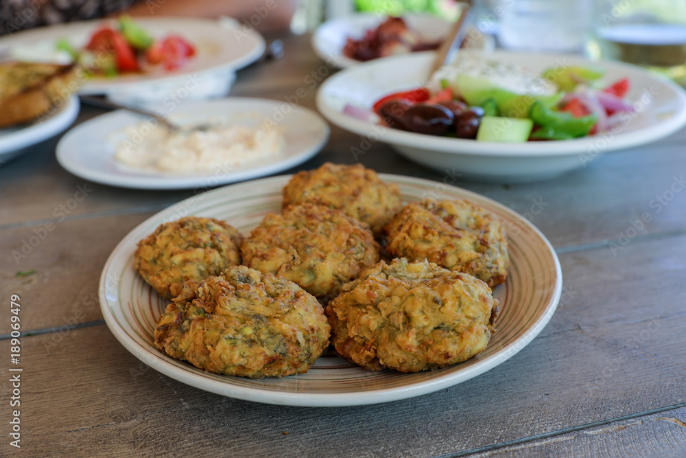 Fried zucchini balls plate in the greek tavern. Fried zucchini balls plate in the greek tavern.