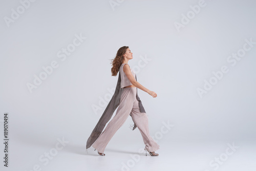 Woman model walking in trend clothing