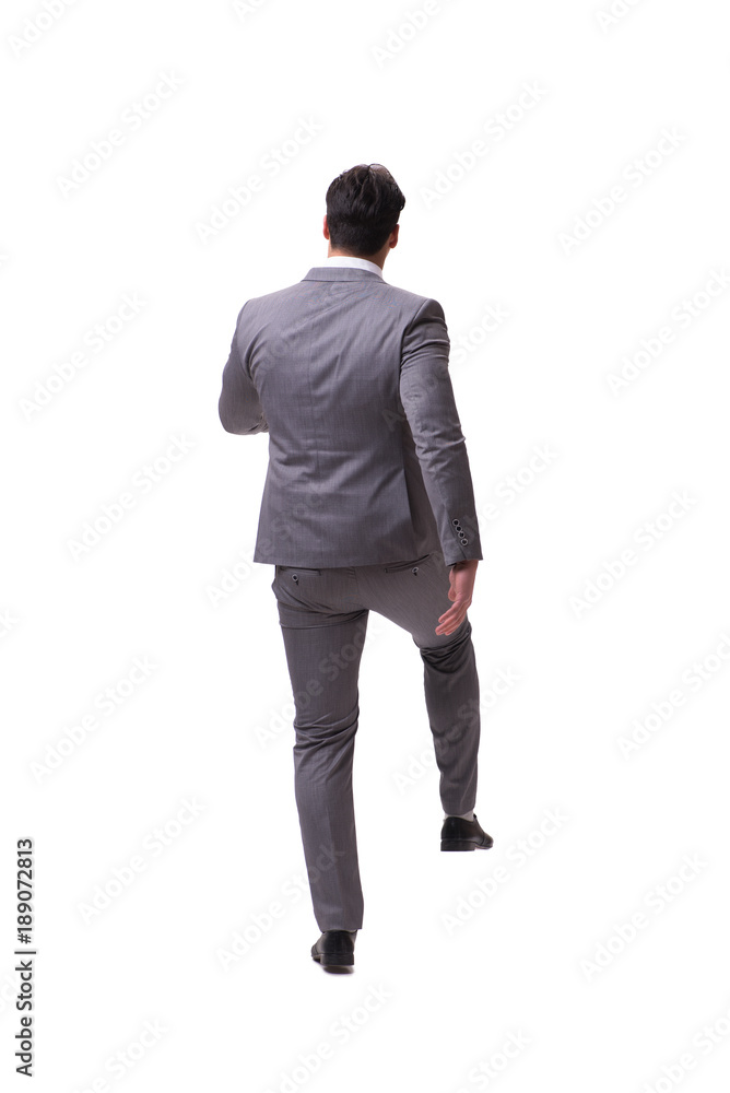 Businessman walking away isolated on white background Businessman walking away isolated on white background