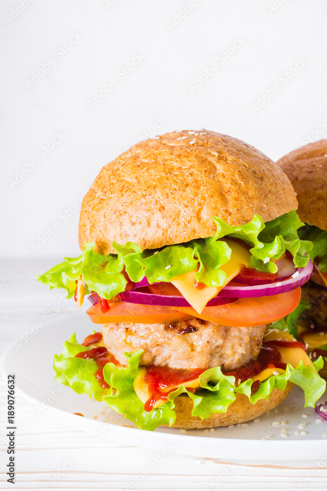 Ready-to-eat hamburger on a plate Ready-to-eat hamburger on a plate