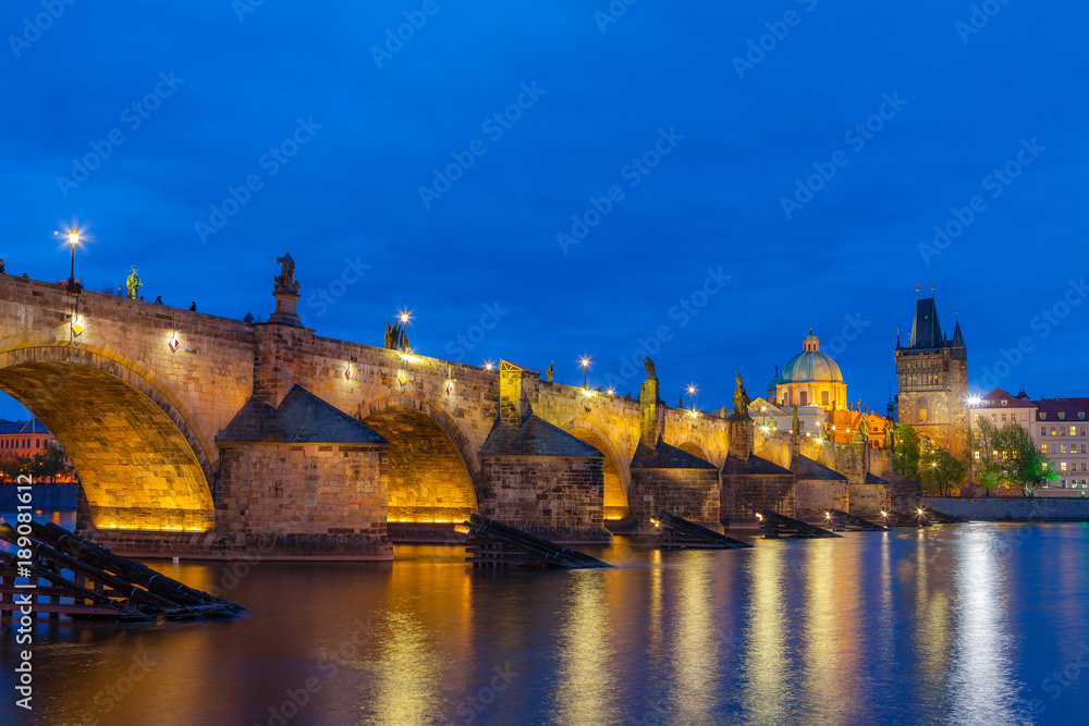 Night and illuminated Charles Bridge, Prague, Czech Republic