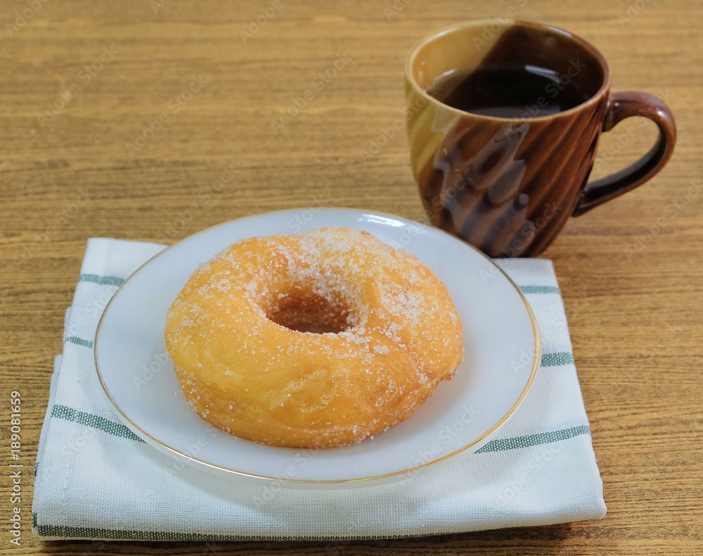 Glazed Donut with Sugar Served with Tea Glazed Donut with Sugar Served with Tea
