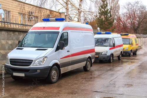Fototapeta Naklejka Na Ścianę i Meble -  Three ambulance cars came to call for victims after an accident, a terrorist attack or an accident.