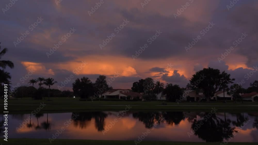 Sunset by a golf course lake Sunset by a golf course lake