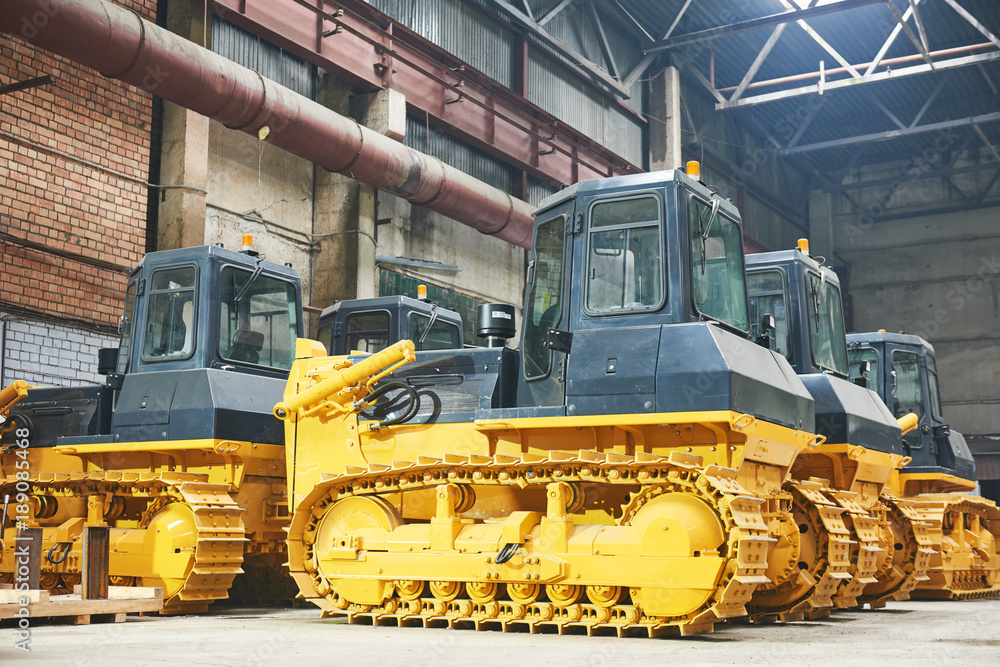 bulldozer in assembly shop in factory