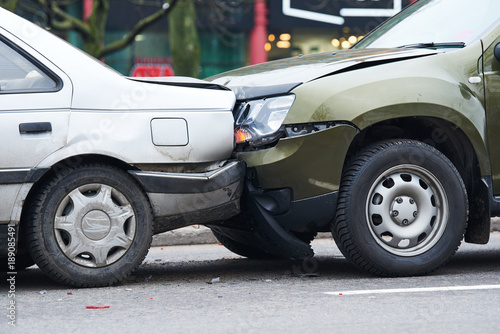 Fotografie car crash accident on street, damaged automobiles after collision in city