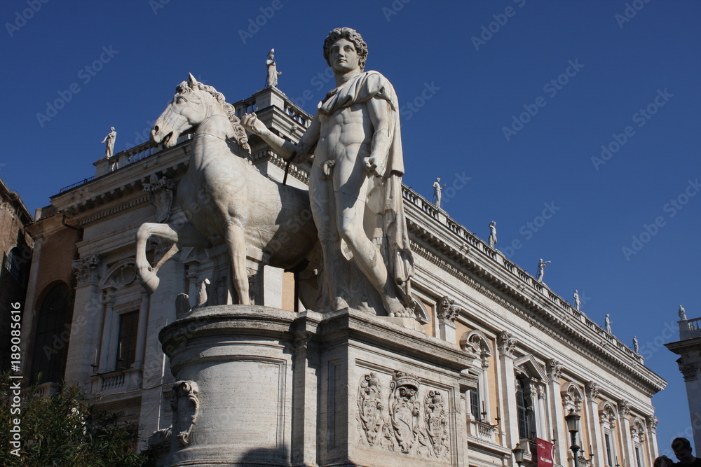 Fototapeta premium Piazza del Campidoglio - Statue of Castor at the Cordonata stairs in Rome, Italy