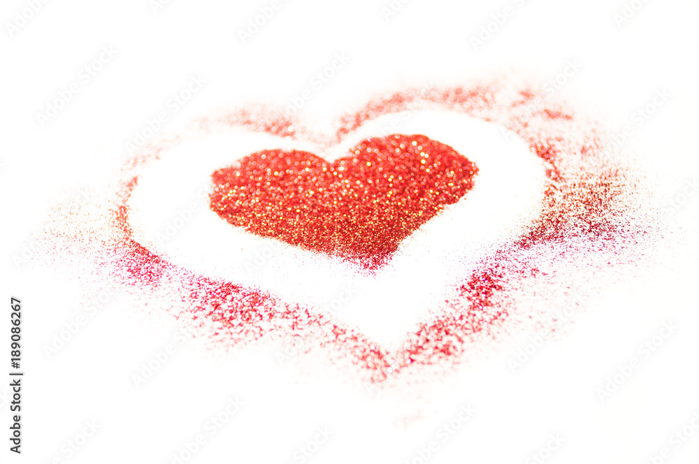 Red glitter heart on a white background for Valentines Day