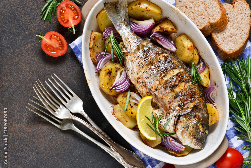 Baked dorado with Provencal herbs and potatoes. Baked dorado with Provencal herbs and potatoes.