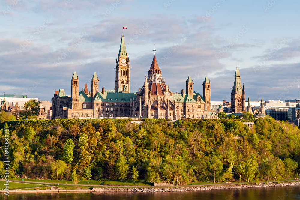 Sunset on Parliament Hill - Ottawa, Ontario, Canada. Its Gothic revival suite of buildings is the home of the Parliament of Canada.