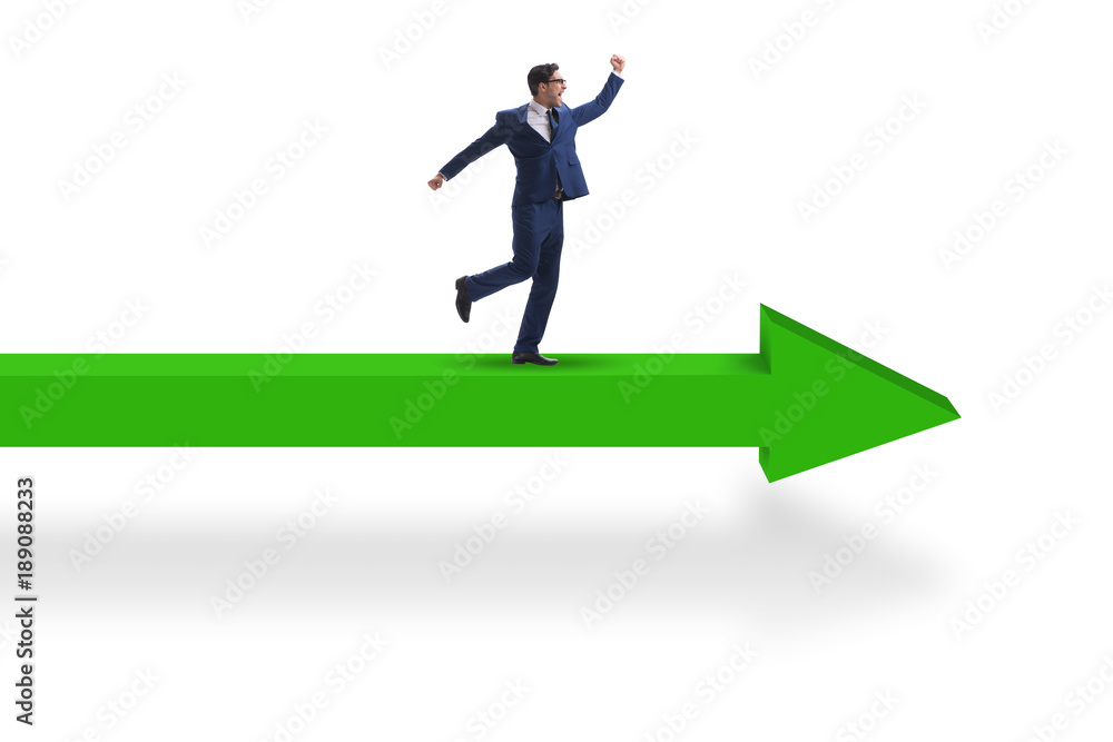 Businessman walking on arrow isolated on white background Businessman walking on arrow isolated on white background