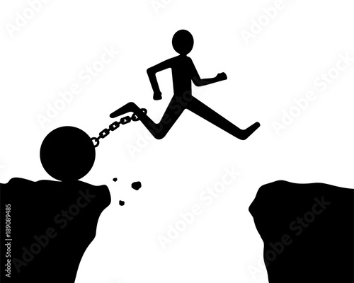 man jumping over obstacle with chain and iron ball