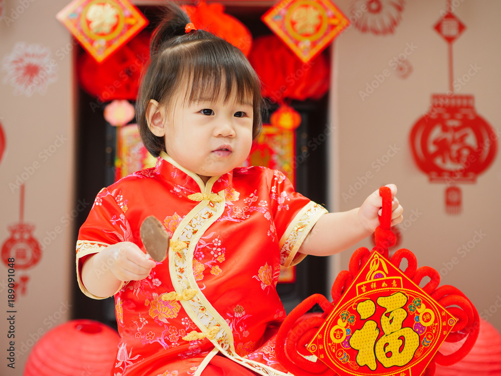 Chinese baby girl with traditional dressing up and Chinese baby girl with traditional dressing up and
