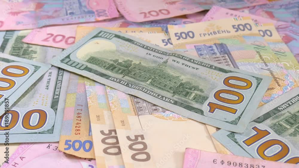 Slider money on the table. Denominations. Dollar and hryvnia Slider money on the table. Denominations. Dollar and hryvnia