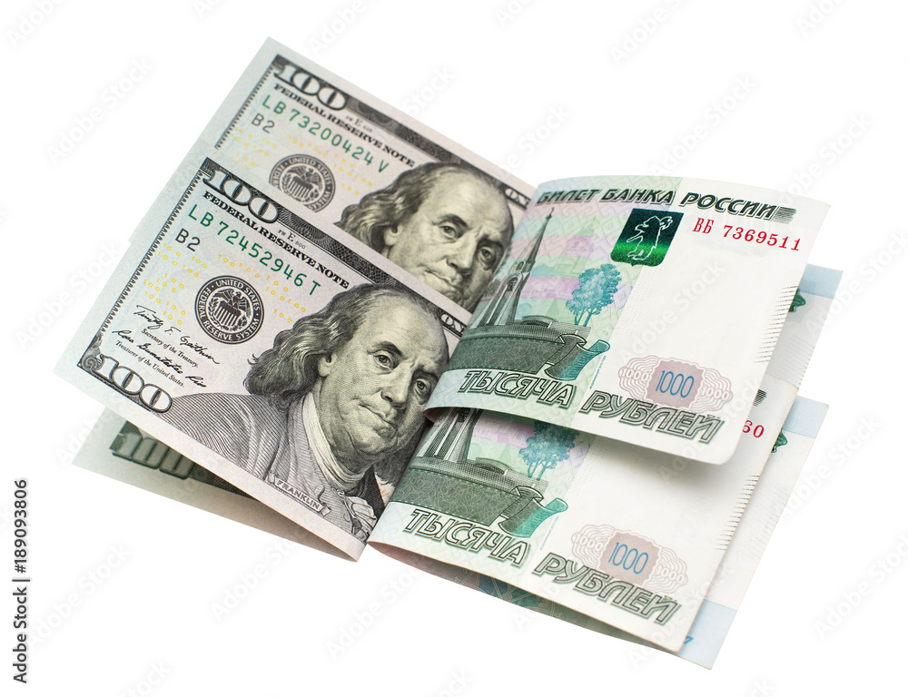 A hundred dollars of American banknotes and one thousand rubles of Russian isolated on white background. Finance, international politics A hundred dollars of American banknotes and one thousand rubles of Russian isolated on white background. Finance, international politics