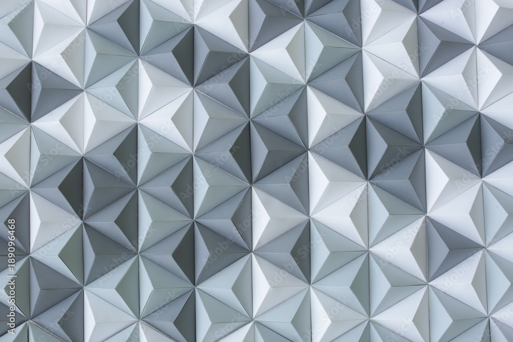 background, modern style, texture concept. backdrop of the theater created in futuristic style of pyramids made of constuction paper in different shades of grey colour background, modern style, texture concept. backdrop of the theater created in futuristic style of pyramids made of constuction paper in different shades of grey colour