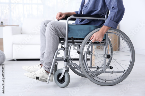 Man in wheelchair indoors