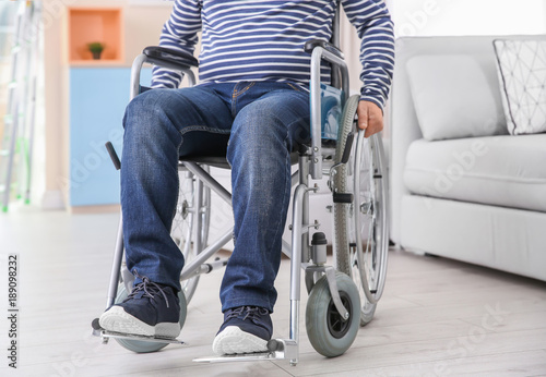 Man in wheelchair indoors