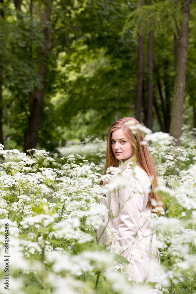 Your path in the life. Balance and harmony. Listen to yourself. Woman in the park Your path in the life. Balance and harmony. Listen to yourself. Woman in the park