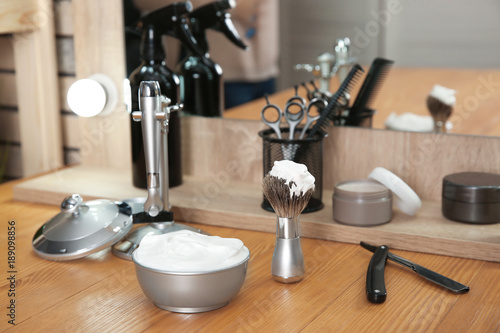 Professional hairdresser set for men on table in salon