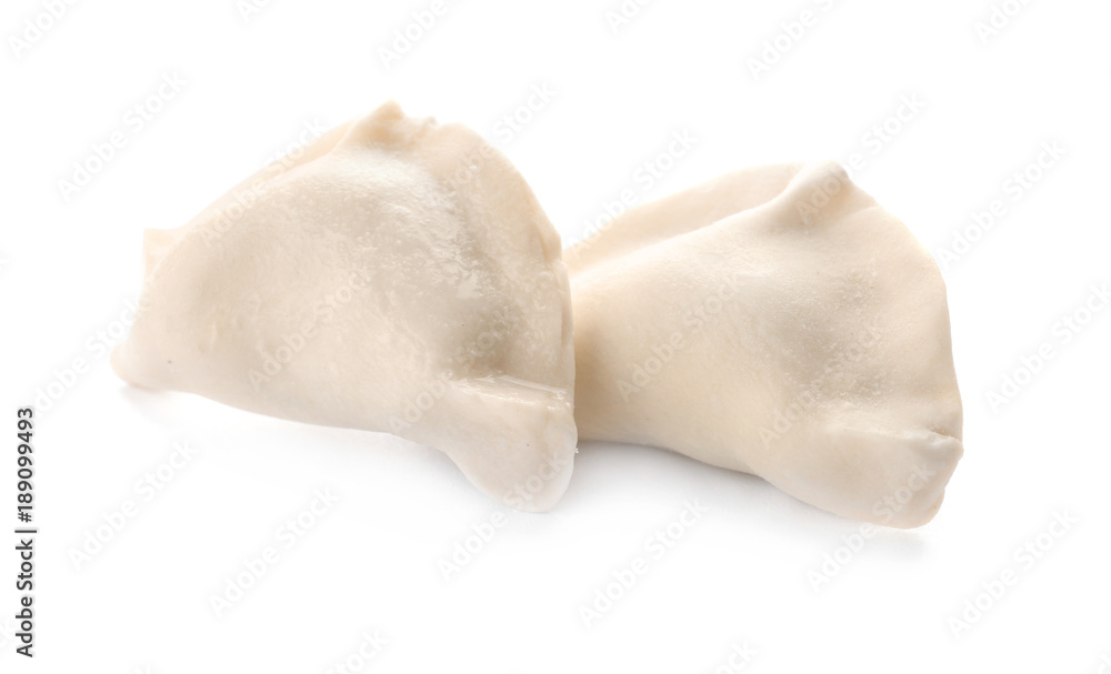 Raw dumplings on white background Raw dumplings on white background