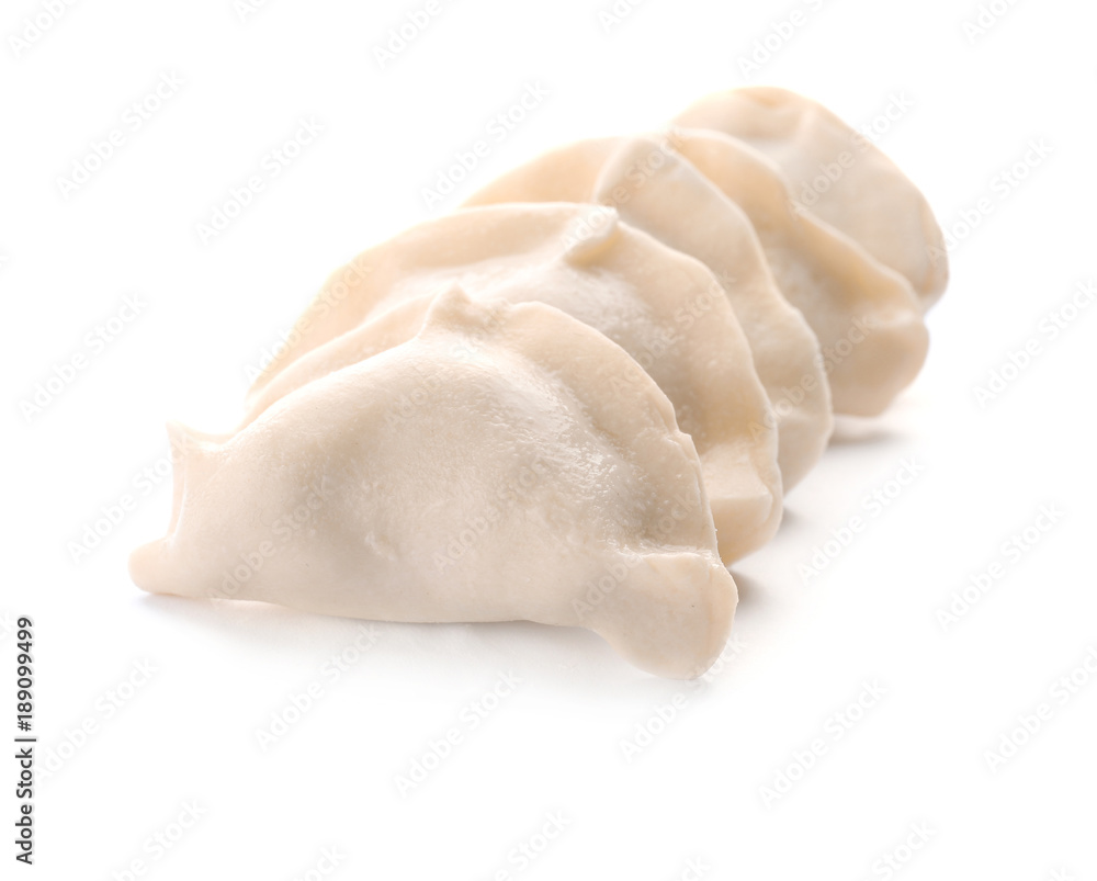 Raw dumplings on white background Raw dumplings on white background