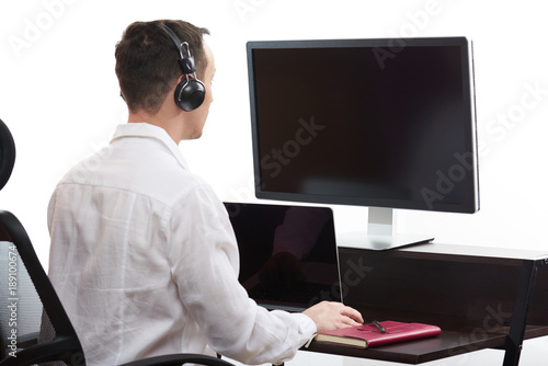 Young man working in office photo