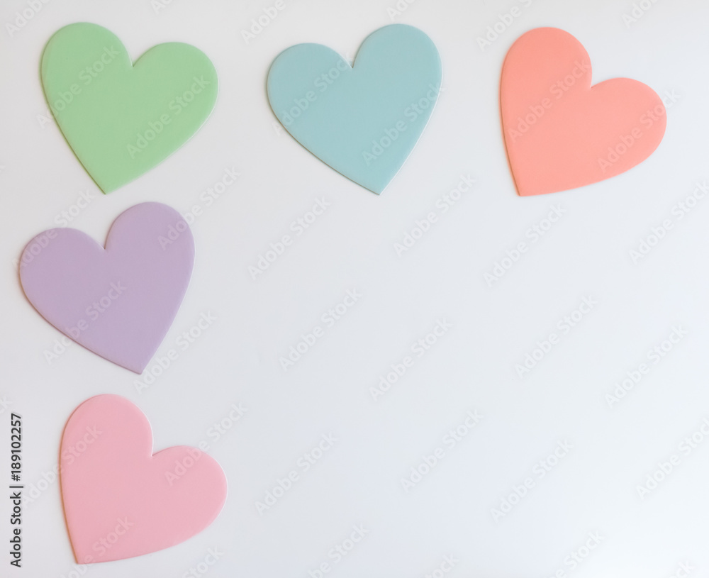 Pastel Paper Hearts on White Background