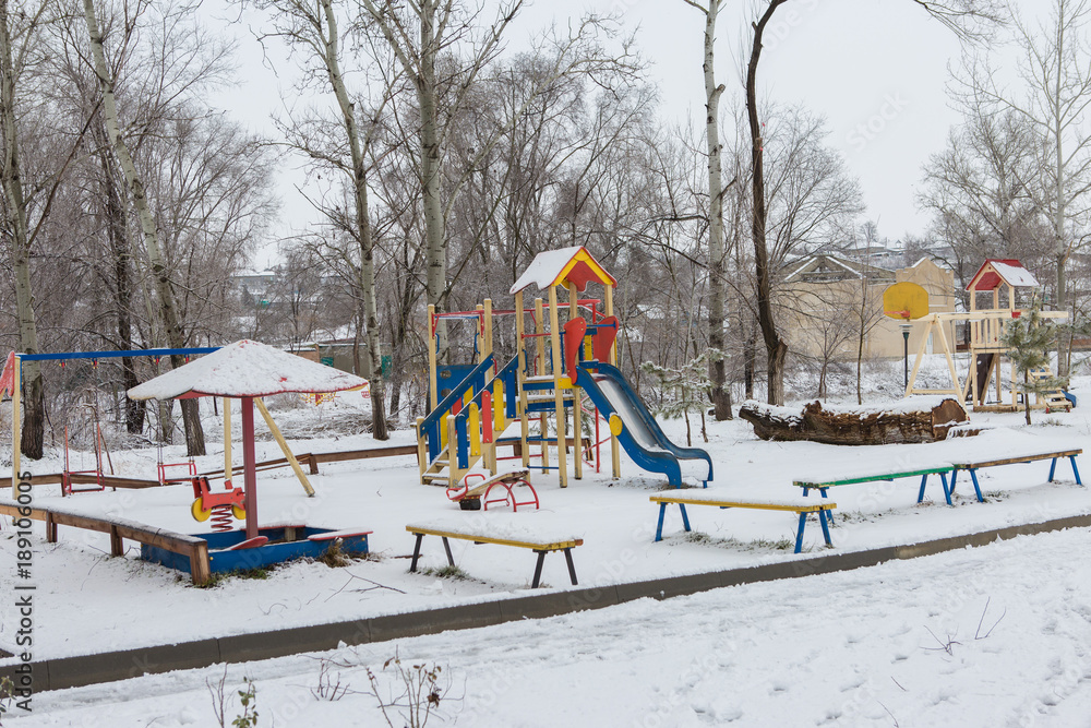 Fototapeta premium playground in winter, children's slide