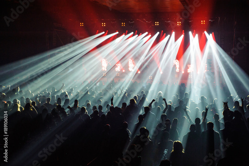 Crowd raising their hands and enjoying great festival party or concert