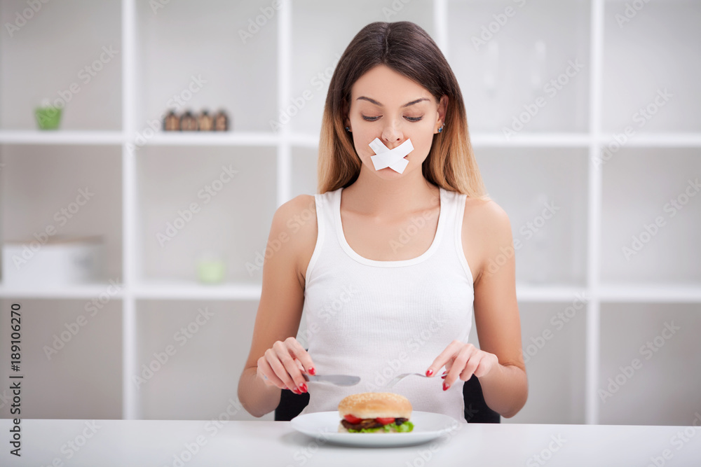 Unhealthy eating. Junk food concept. Girl don't eat junk food Unhealthy eating. Junk food concept. Girl don't eat junk food
