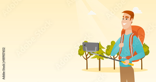 Young happy caucasian white traveler man holding a selfie-stick and making selfie. Smiling traveler man with a backpack taking photo with a mobile phone. Vector cartoon illustration. Horizontal layout